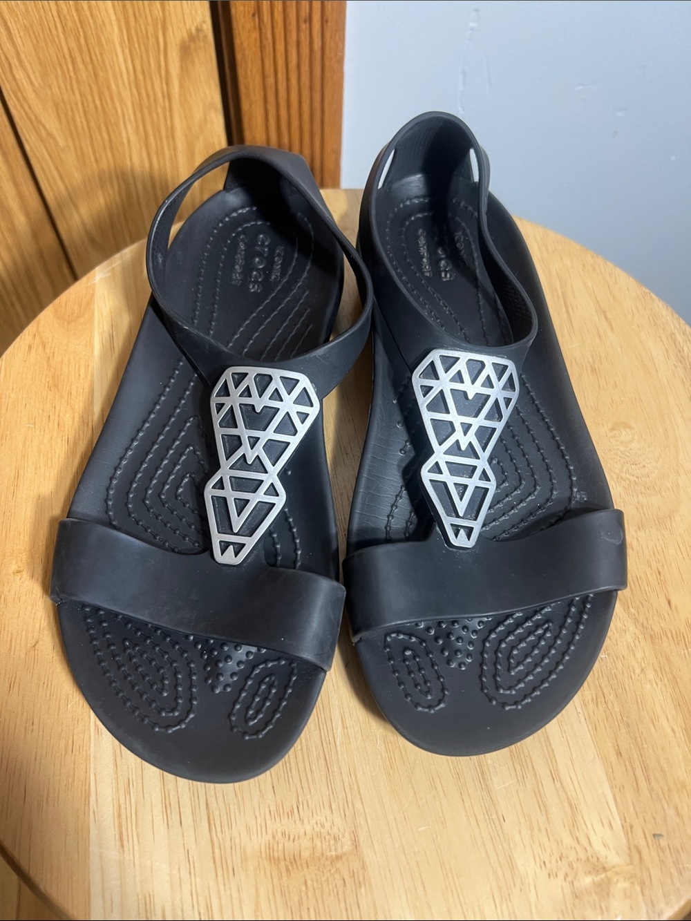 CROCS Black Slingback Sandals with Silver Geometric Accent